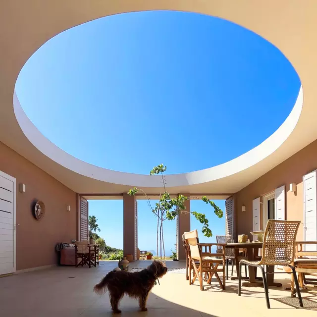 Villa Katerina, the house we designed pre-Covid on the Greek island of Kythira, is now complete. It is arranged around a central courtyard which sports a giant oculus opening onto the cerulean Mediterranean sky.

#greekisland #kythira #oculus #courtyard #courtyardhouse #bluesky #doglovers #views #islandliving #architectinoxford