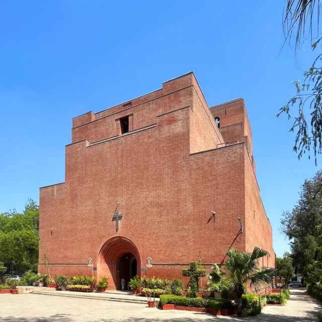 Our Director, Adrian, had yearned to visit this building since he came across archive photographs of it in the RIBA picture library 30 years ago. He finally got there last week.
St Martin’s Garrison Church in New Delhi was designed by Arthur Shoosmith, who was out there to supervise the construction of Edwin Lutyens’ Viceroy’s House down the road. As the pics show, he chose to use nothing but bricks - 3.5 million of them. This singular approach was supported by the great man himself who advised: ‘My Dear Shoo, Bricks! A building of one material is for some strange reason much more noble than one of many. It may be the accent it gives of sincerity, the persistence of texture and definite unity.… Don’t use, whatever you do, bricks on edge or any fancy stuff. It only destroys scale and promotes triviality…. The Romans did it! Why should not Britons? You will get a fine wall, and their mass, proportion, with precious fenestration, will do the rest.’ Too bloomin right.
The church’s centenary is coming up in three years’ time. It looks as magnificent as it did in those archive photos, albeit now thoroughly bedded into its context of lush green gardens and school playgrounds; it is still in use with three separate congregations every Sunday. It is, IMHO, as powerfully resonant as the works of those other Europeans who did their stuff in India later in the century - le Corbusier and Kahn. This is not to diminish their achievements in Ahmedabad and Chandigarh, just to say that Shoosmith got there first in his small but mighty way. Corb eschewed adornment and defined architecture as the “masterly, correct and magnificent play of masses brought together in light”; Kahn eulogised brick and its desire to be an arch. This building is a prescient embodiment of both their manifestos.

#brick #delhi #newdelhiarchitecture #BrickArchitecture #ExposedBrick #NewDelhiArchitects #IndianArchitecture #BrickDetail #SustainableArchitecture #DelhiDesign